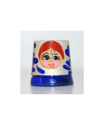 Silver doll with a blue flower