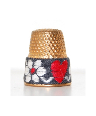 Metal with embroidery