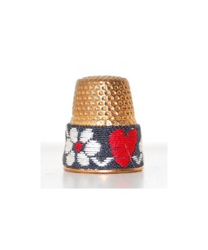Metal with embroidery