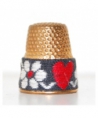 Metal with embroidery