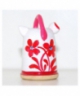 Kettle with red flowers