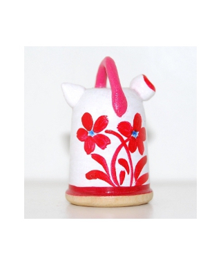 Kettle with red flowers