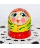 Round dark yellow doll