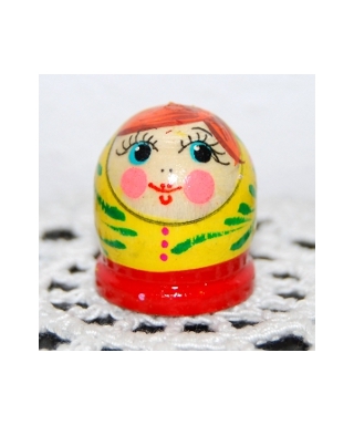 Round dark yellow doll