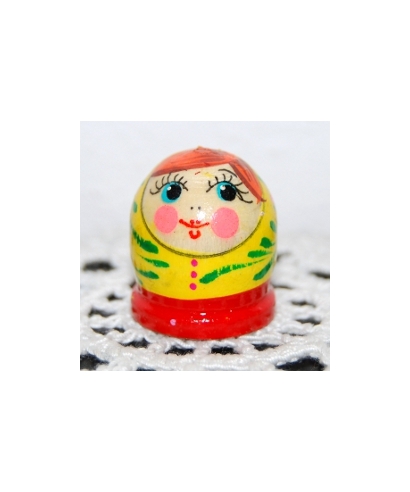 Round dark yellow doll