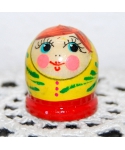 Round dark yellow doll