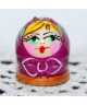 Round violet doll