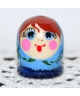 Round pale blue doll