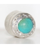 With turquoise eye